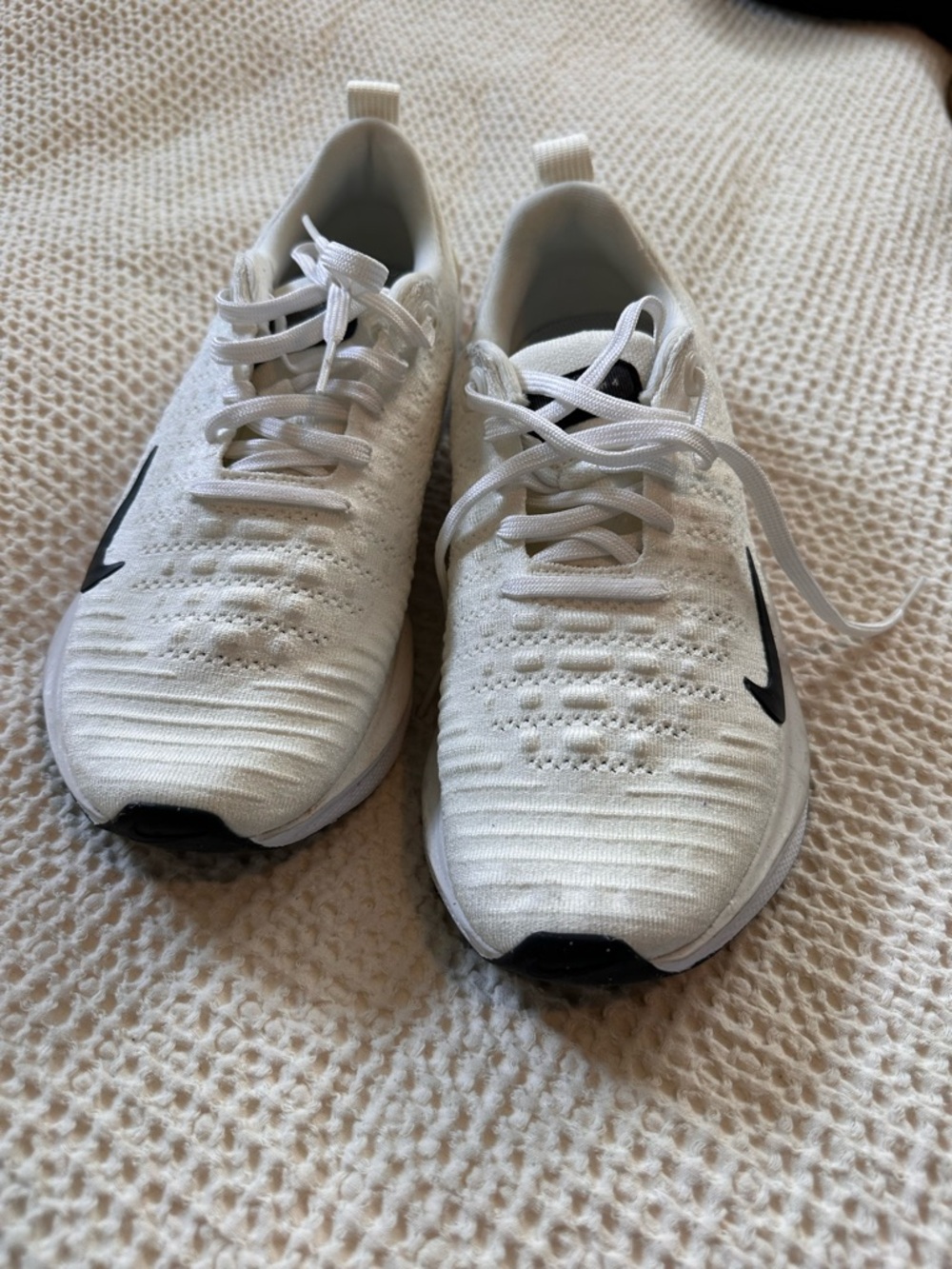 Nike White Athletic Sneakers with Black Swoosh